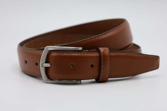3,5CM COGNAC RIEM MET GLADDE AFWERKING MET EEN OUD ZILVEREN GESP. VERKOOPPRIJS: 24,95,-